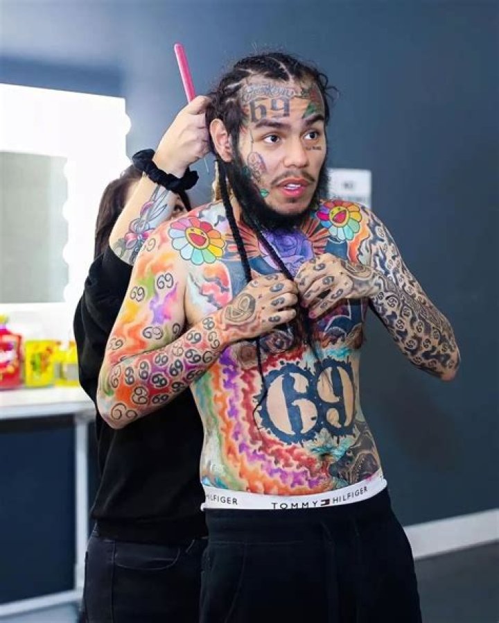 6ix9ine’s 7 Weird Tattoos & Their Meanings