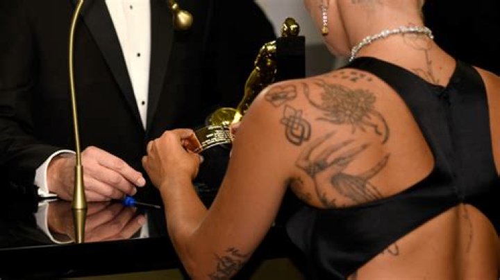 Lady Gaga’s 12 Insane Tattoos & Their Meanings